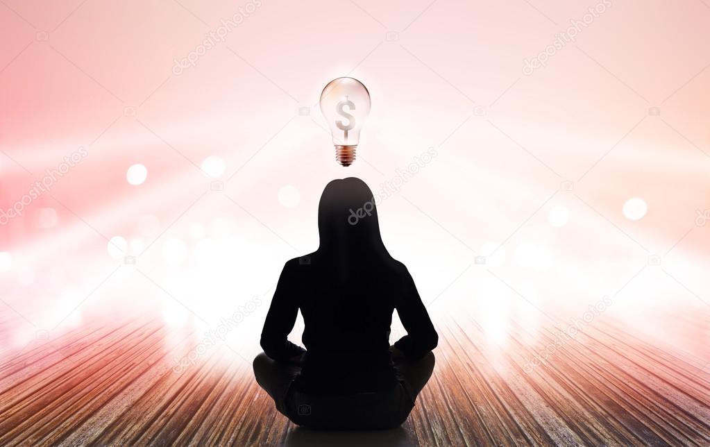 abstract woman meditating at rays of light pastel and lightbulb