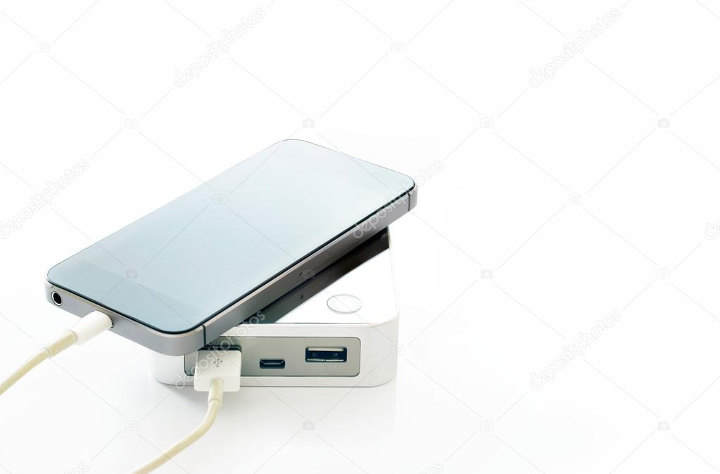 Mobile smartphone and power bank on white background