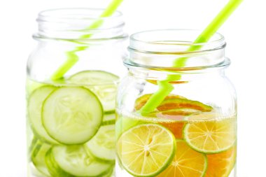 Infused detox water, bright and colorfull tone, Detox diet lemon and cucumber on white background