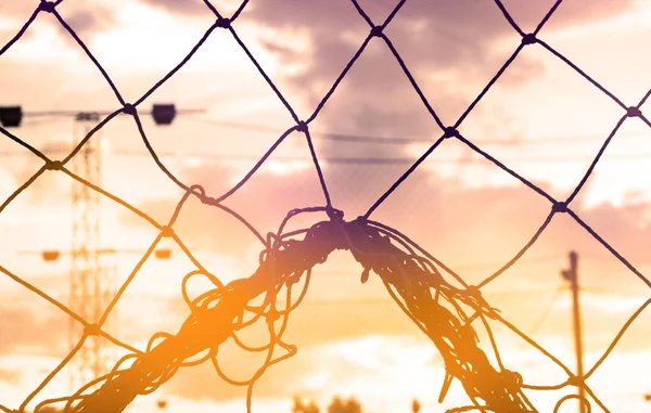 Abstract, silhouet kleurrijke van doel net voetbal in de zonsondergang, — Stockfoto