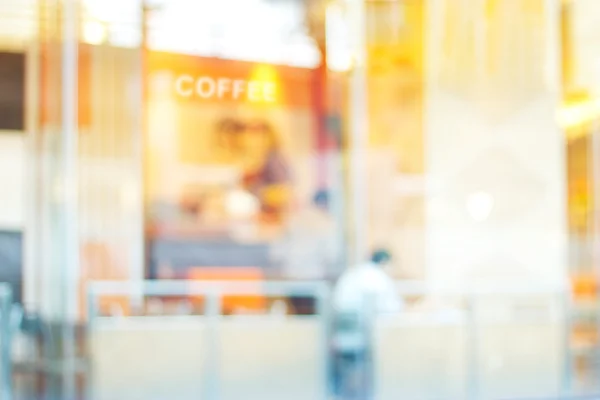 Suave y borrosa de colorida cafetería en el centro comercial —  Fotos de Stock