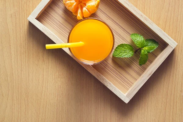 Orange and orange juice with mint in tray wood on wooden background — Stock Photo, Image