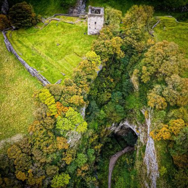 Aerial view of Peveril Castle ruins in Castleton in Peak District, England, UK clipart