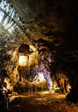 View of the Peak Cavern, also known as the Devil's Arse, in Castleton, Derbyshire, England, UK