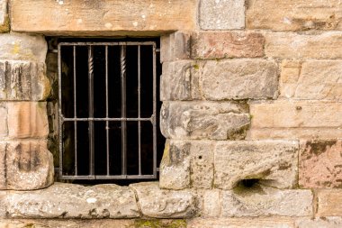 Old vintage door of stone building in Scotland, UK