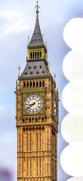 A vertical view of Big Ben clock tower at the north end of the Palace of Westminster in London, UK