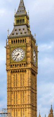 A vertical view of Big Ben clock tower at the north end of the Palace of Westminster in London, UK clipart