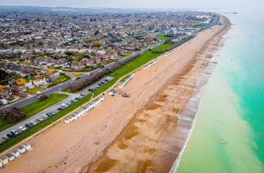 Aerial view of beach cabins on the seaside of England, UK