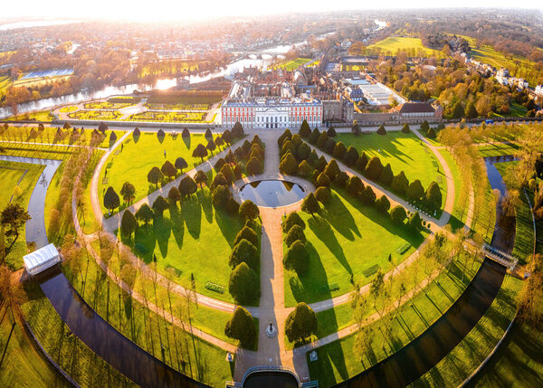 The aerial view of Hampton Court Palace, a royal palace in the London Borough of Richmond upon Thames, UK