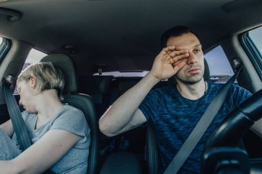 Bored people drive a car together, yawning and struggling to sleep while holding the wheel. Drowsiness and depression of the driver, the need to rest and stop clipart