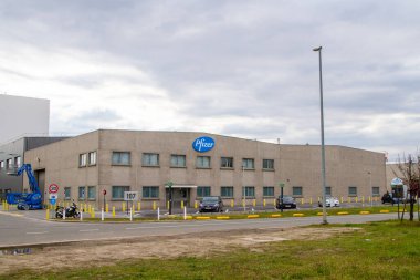 Belgium, Puurs, April 16, 2021. Pharmaceutical company Pfizer, Coronavirus vaccine, Covid 19. American pharmaceutical company founded in 1849. Present in more than 150 countries, It has discovered a vaccine against Covid 19.