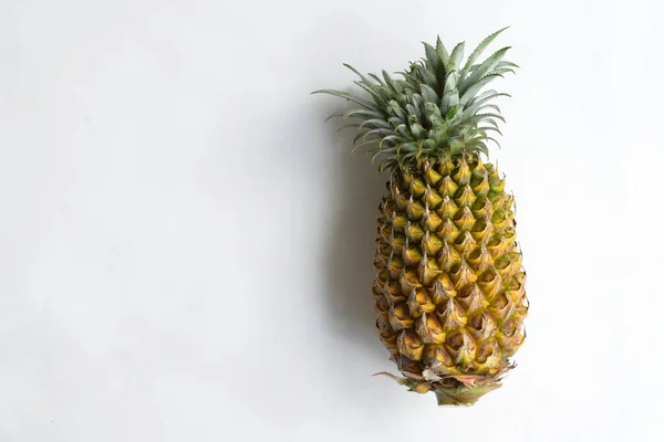 Two orange pineapples isolated in white background, no shadow, fresh tropical fruit background, summer, holiday, food and beverage, juicy, cool, vegan, healthy food, fitness