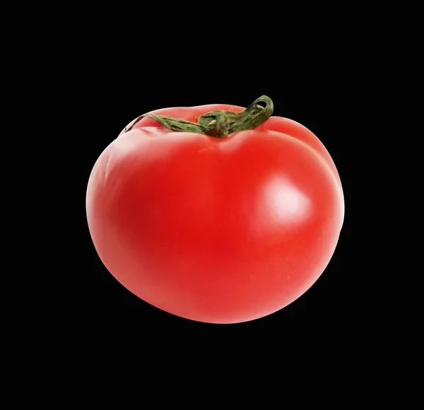 Red  big tomato with clipping path, no shadow in black background, side view