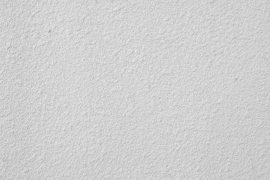 Asgari soyut arkaplan için pürüzlü yüzeyi olan beyaz duvar dokusu. Mimari tasarım, yaratıcı arkaplan ve modern asgari konsept için basit temiz alçı deseni.