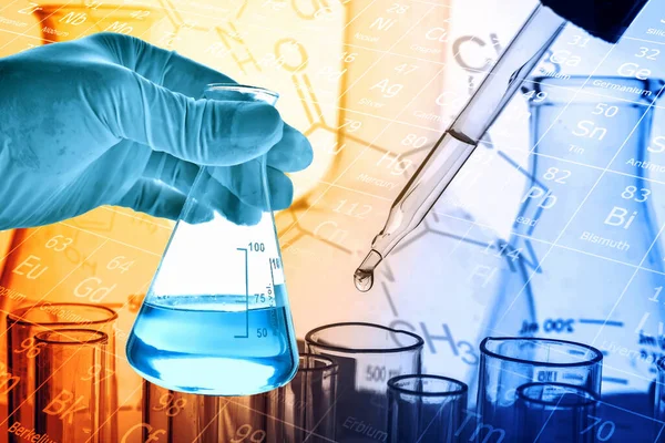 hand of scientist holding flask with lab glassware in chemical laboratory background, science laboratory research and development concept