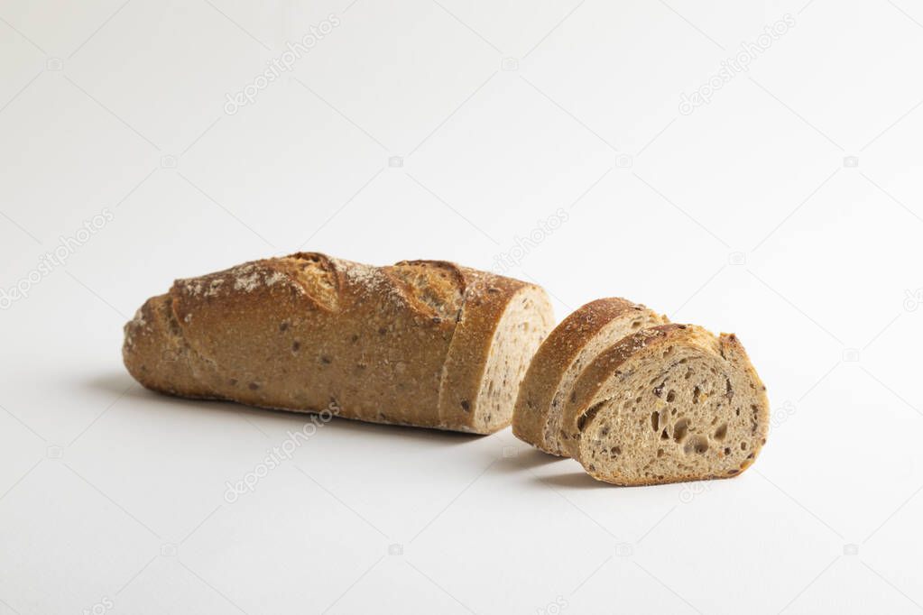 Unleavened chrono bread with seeds on a white background