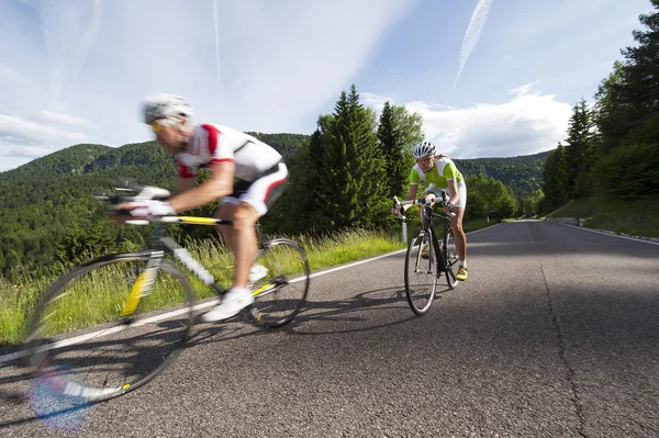 Blurred motion road cycle downhill — Stock Photo, Image