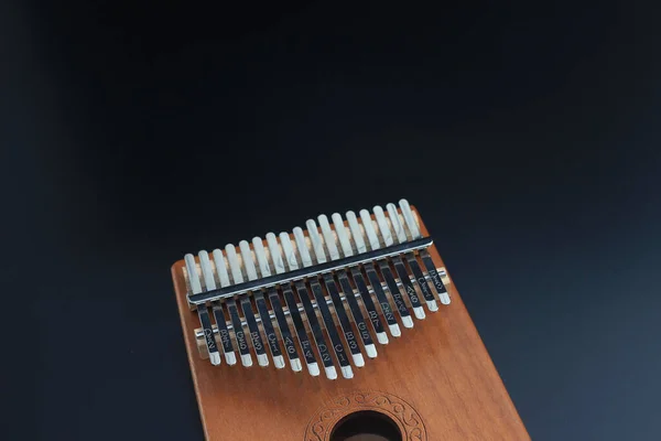 Kalimba, acoustic music instrument from africa at Black Backgroun