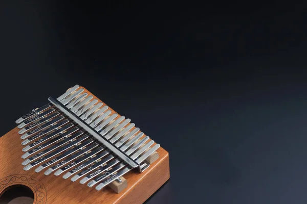 Kalimba, acoustic music instrument from africa at Black Backgroun