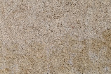 Old stone wall in beige and gray tones. Background and texture.