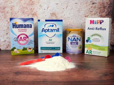 Bucharest, Romania - July 26 2020: Various anti-reflux infant milk brands sold in Romania. Special thickened AR milk formula for the relief of gastric reflux and regurgitation.