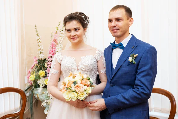 the newlyweds sign the marriage certificate, the lovers fill out the marriage contract, the family legal document at the wedding