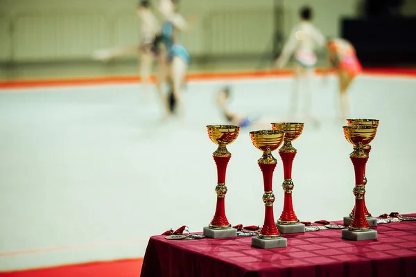 Awards Medals Gold Cups Table Prizes Champions Sports Competition Background — Stock Photo, Image