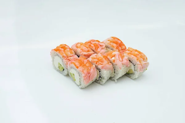 Uma Porção Rolos Sushi Está Sobre Mesa Fundo Branco Prato — Fotografia de Stock