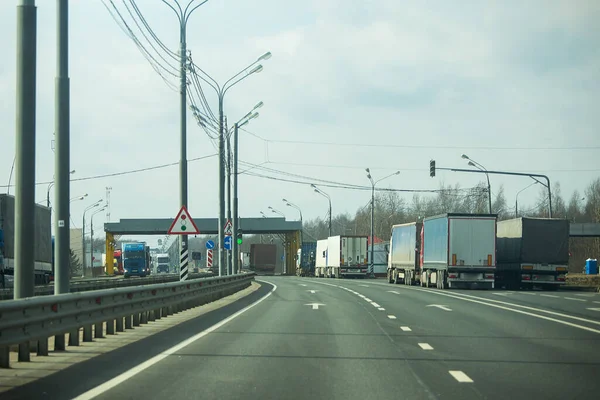 a long traffic jam of many trucks at the border , a long wait for customs checks between States due to the coronavirus epidemic, increased sanitary inspection of cargo transport