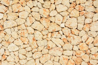 Doğal taş duvar, kum rengi dokusu.,