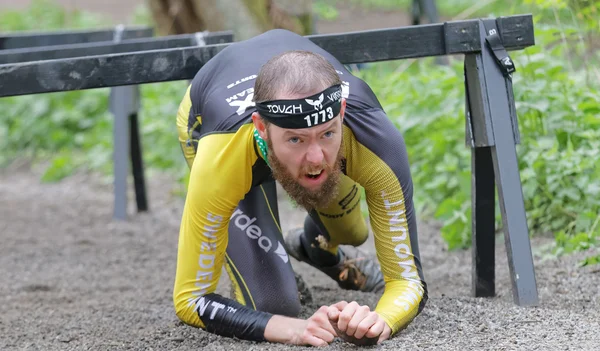 Stockholm Sweden May 2016 Struggling Man Crawling Bars Obstacle Race — ストック写真
