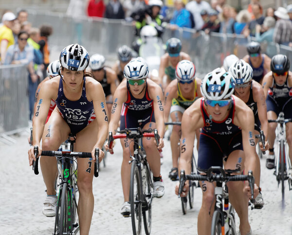 STOCKHOLM - JUL 02, 2016: Group of american female triathlete cyclists Sarah True and Taylor Knibb and competitors in the Women's ITU World Triathlon series event July 02, 2016 in Stockholm, Sweden