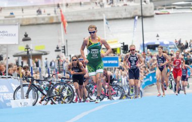 STOCKHOLM - JUL 02, 2016: Group of triathletes running in the transition zone in the Women's ITU World Triathlon series event July 02, 2016 in Stockholm, Sweden