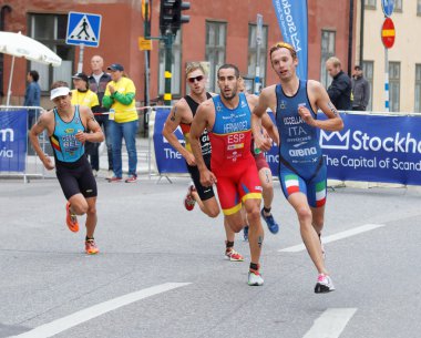 Çalışan triathletes eski şehir Stockholm