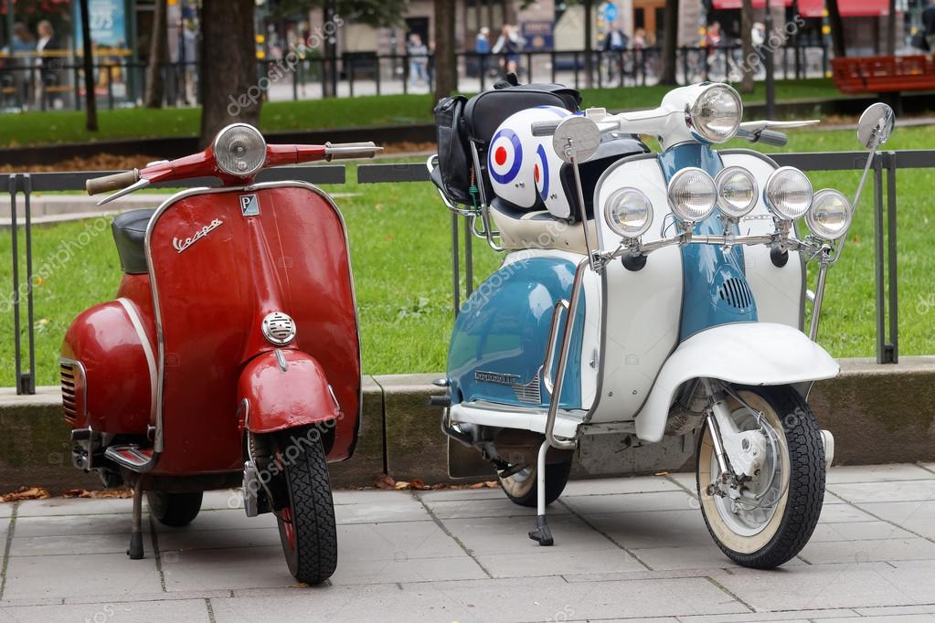 Two Beautiful Red And Blue White Retro Vespa Scooters Parked Stock Photo 122289576 Two Beautiful Red And Blue White Retro Vespa Scooters Parked Stock Photo 122289576