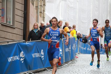 Triathletes Pierre Le Corre, Vincent Luis ve Alessandro Fabian