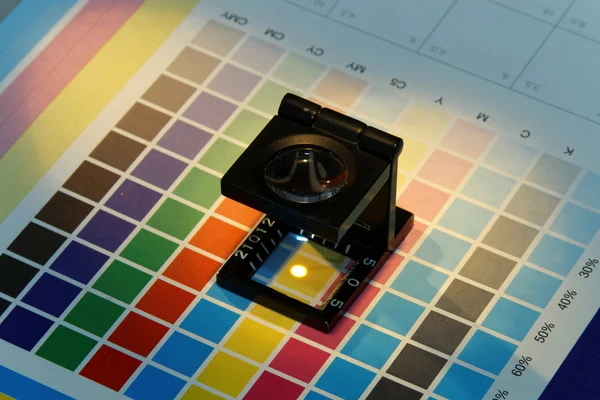 Close-up of a loupe on a test print — Stock Photo, Image