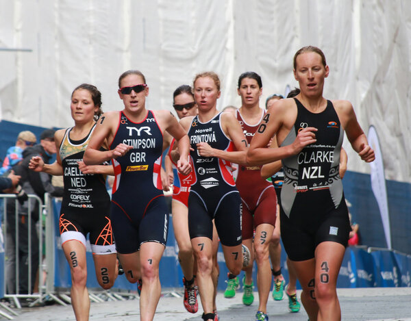 Jodie Stimpson, Rebecca Clark and Vendula Frintova, running