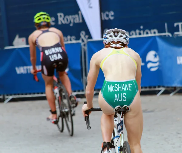 McDhane and Burns cycling in the triathlon event