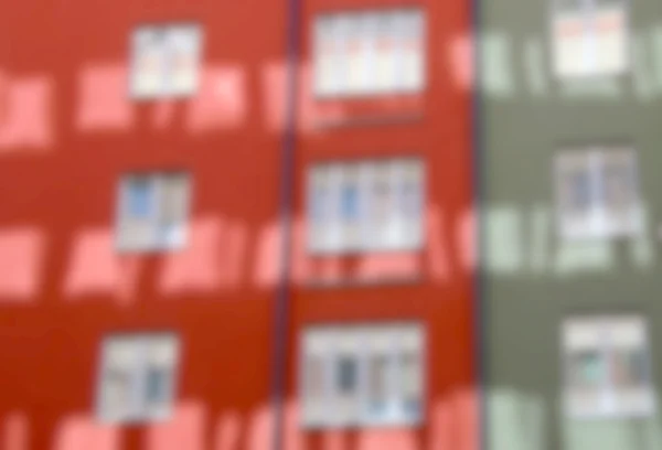 Defocused bakgrund av röda och gröna hus — Stockfoto