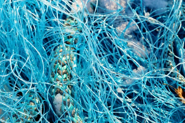 Синя рибальська мережа крупним планом — стокове фото