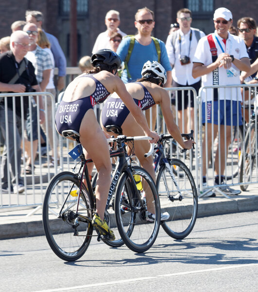 Sarah True and Katie Zaferes cycling