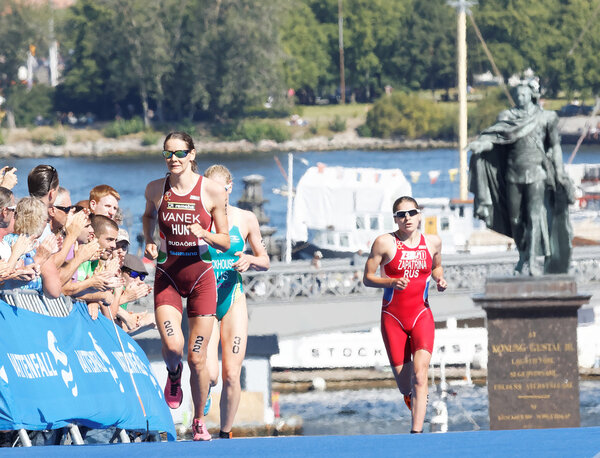 Triathlete Margit Vanek and comptitors  running