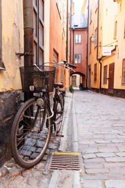 Colorful buildings and bicycle in central Stockholm, Sweden