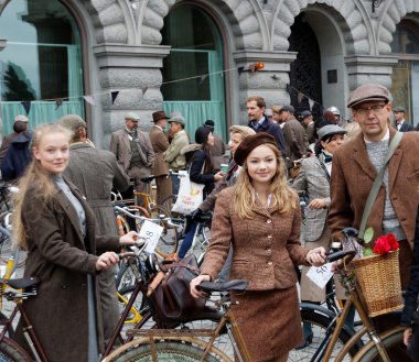 Elegant family wearing old fashioned clothes