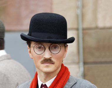 Young man wearing old fashioned tweed clothes