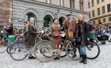 Elegant family wearing old fashioned clothes