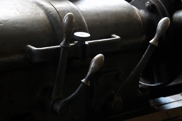 Metal handles on old lathe — Stock Photo, Image