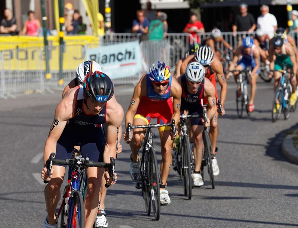 Close-up of group of cycling triathlon competitors — Stock Photo, Image