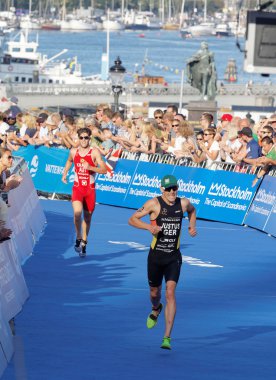 Running triathlete Steffen Justus fighting at the finish